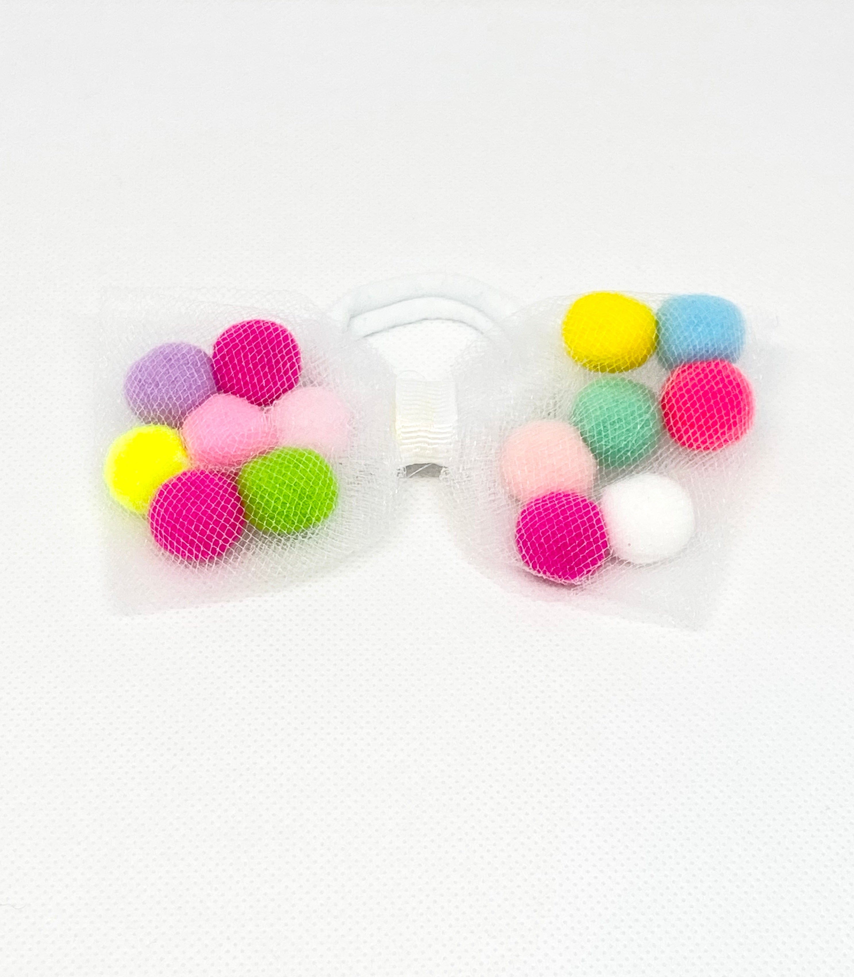 pom pom hair tie bow for children, designer hair ties, designer kids accessories, tutu joli white pom pom tutu skirt, pom pom tutu, white tutu skirt for toddlers, pom pom hair bow, pom pom bow ponytail holder, pom pom hair accessories, birthday tutu white, rainbow pom pom balls tutu